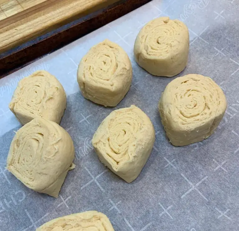 crescent rolls on parchment paper