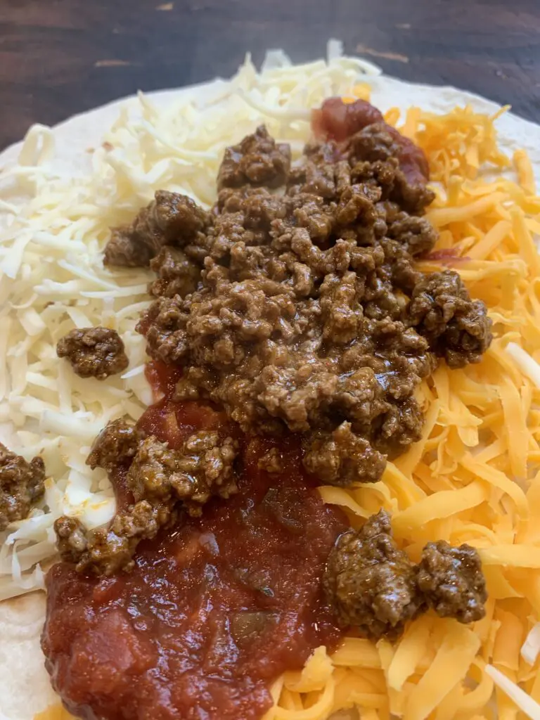 flour tortilla with cheese, salsa and taco seasoned ground beef