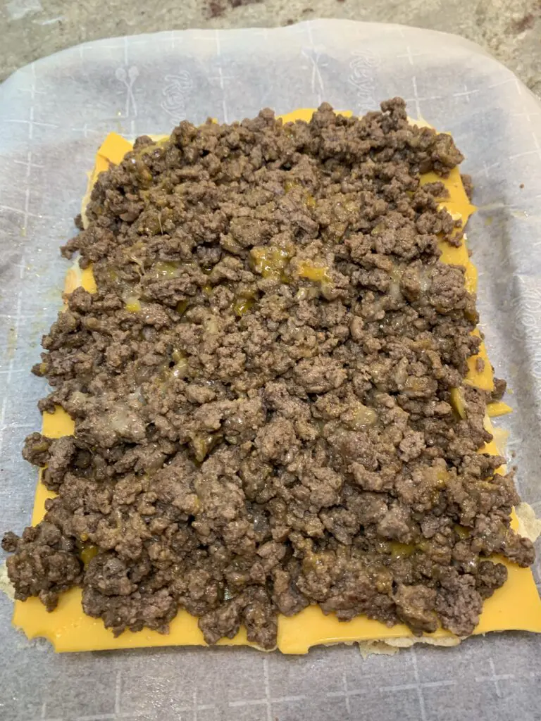 beef on top of cheese