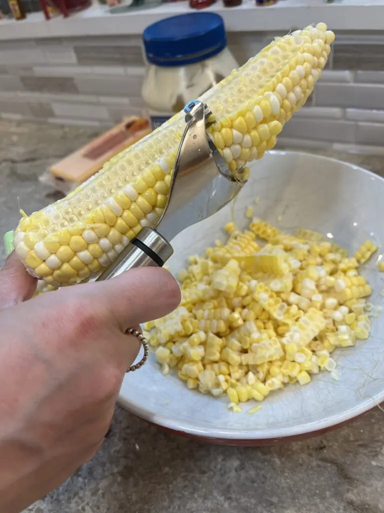 removing corn from the cob