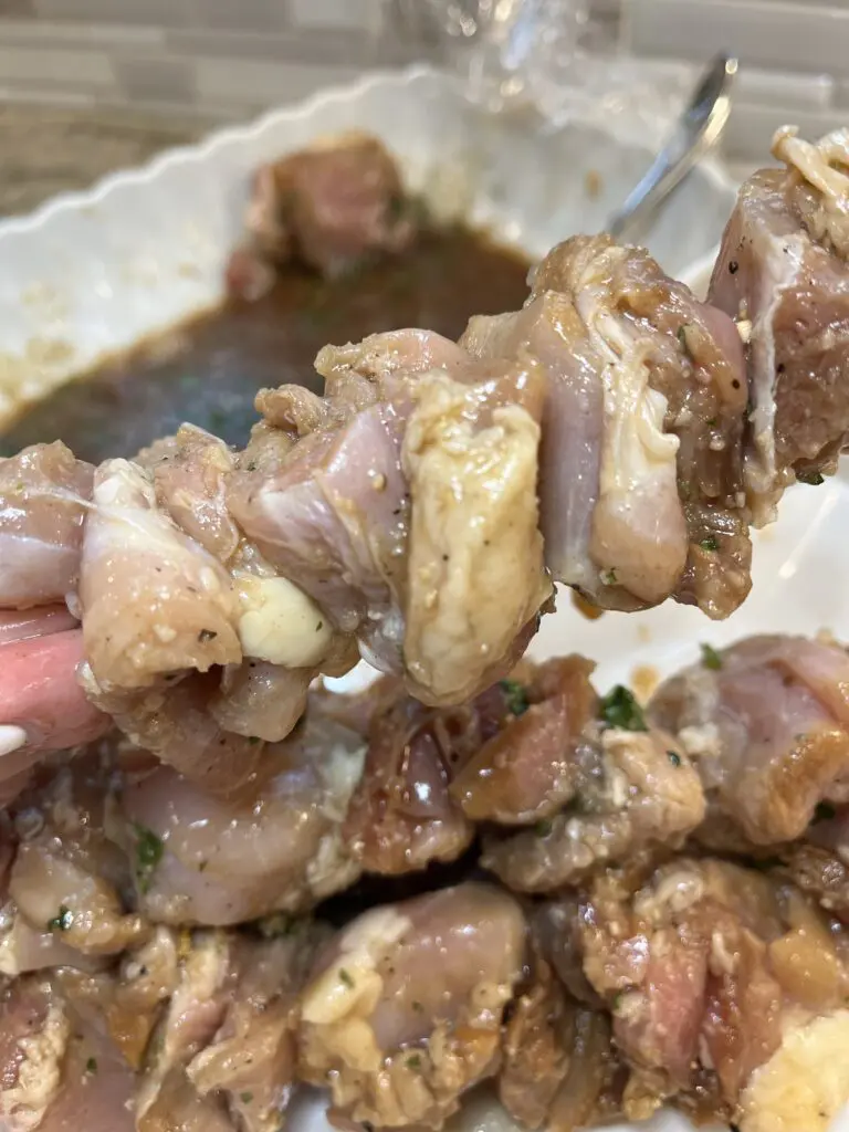 the marinated chicken skewered