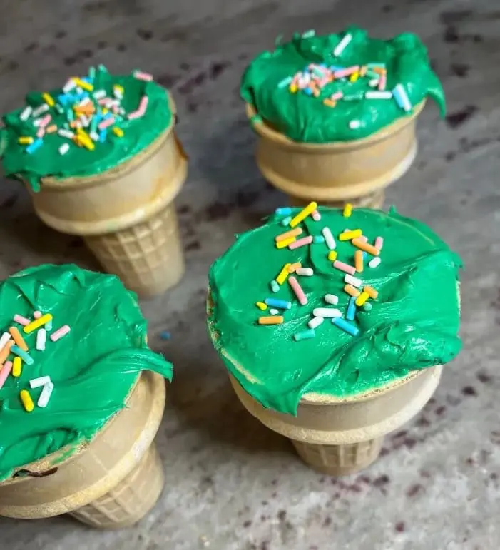 ice cream cone cupcakes with green icing