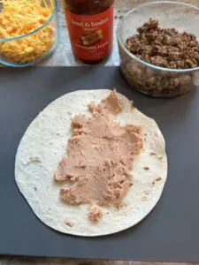 refried beans in tortilla