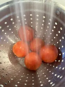 cleaning the tomatoes