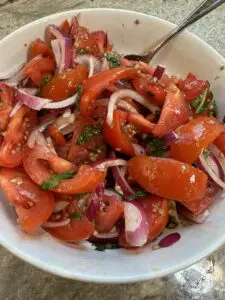 sliced tomatoes and red onion