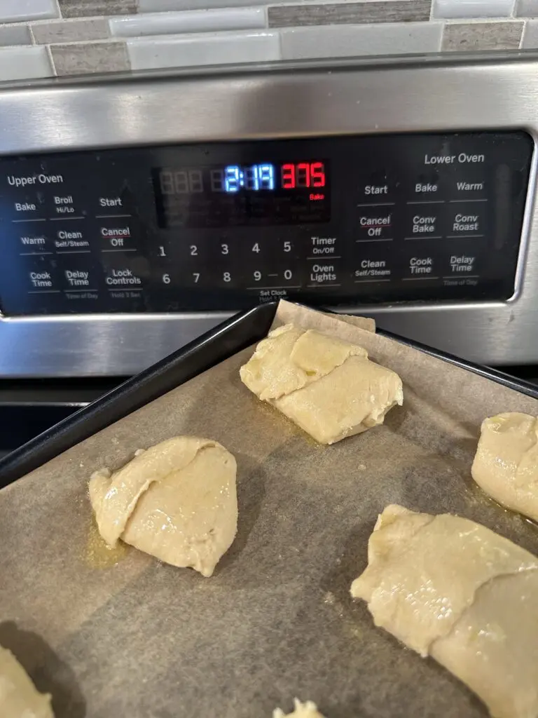 crescent rolls on parchment paper