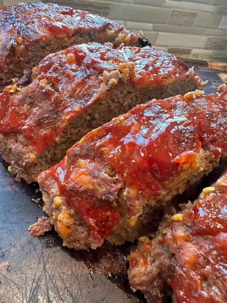Closeup of sliced bacon cheeseburger meatloaf