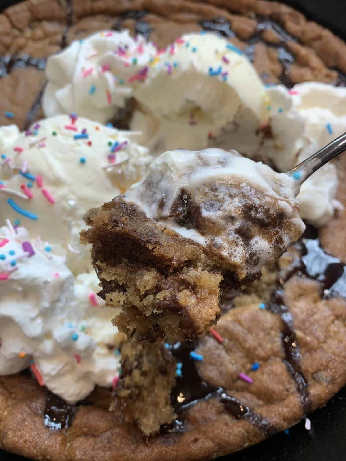 finished cookie in cast iron skillet