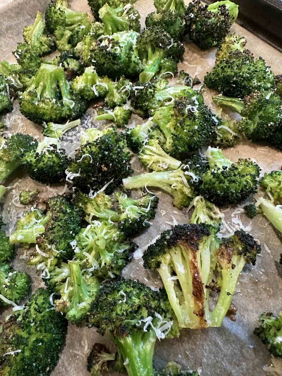 finished roasted broccoli with lemon and parmesan cheese