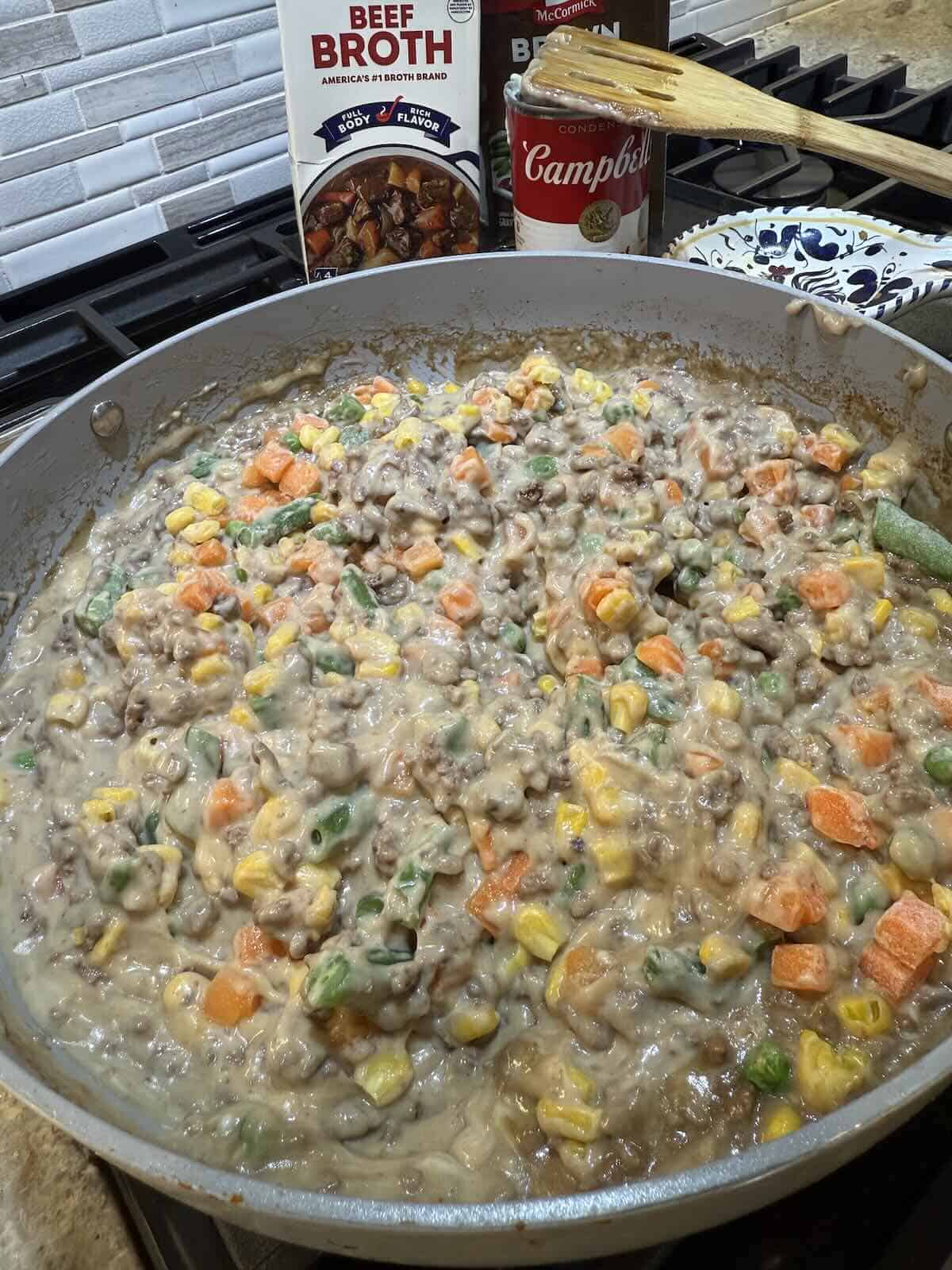 cottage pie ground beef and vegetables in skillet