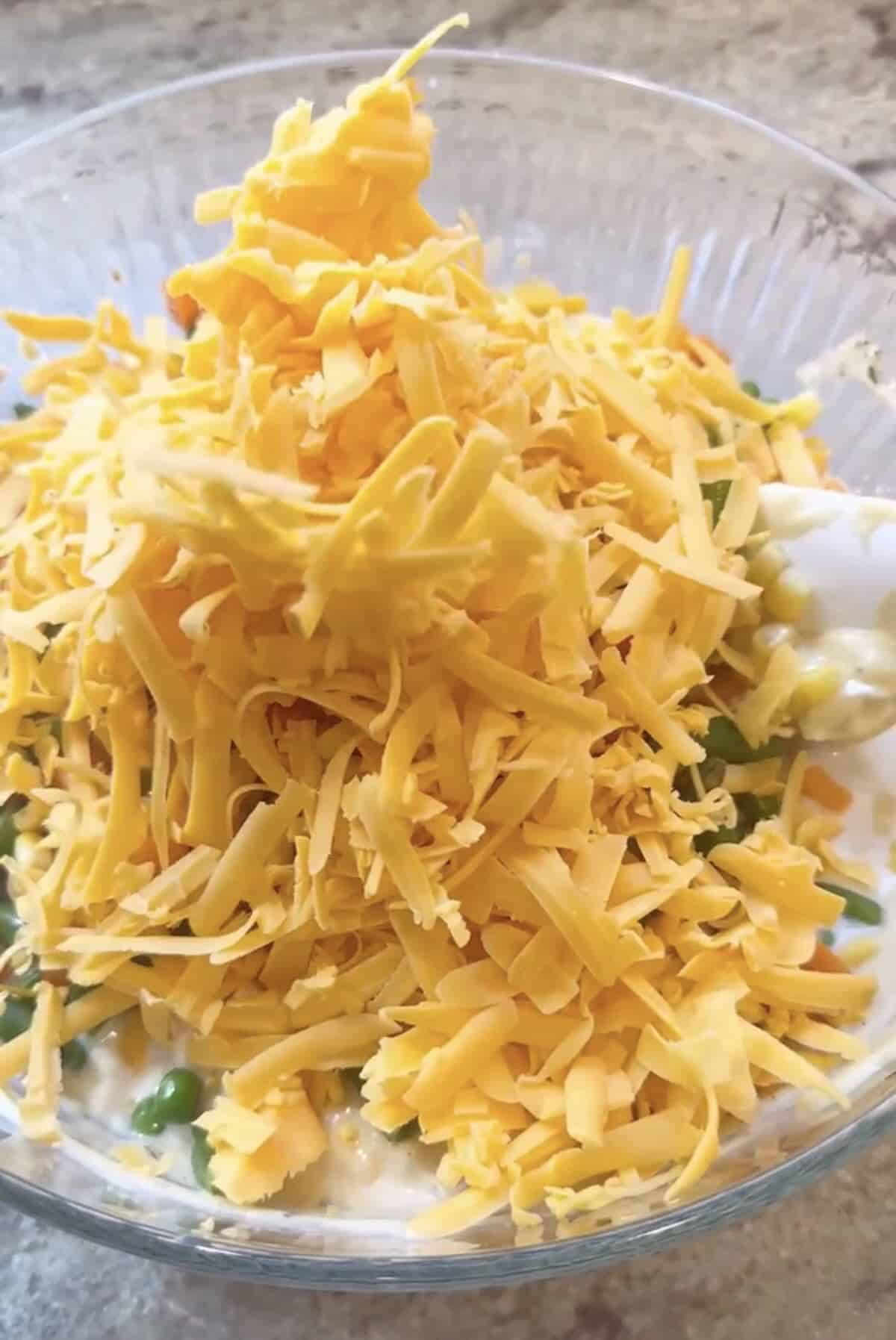 chicken pot pie casserole ingredients in a bow