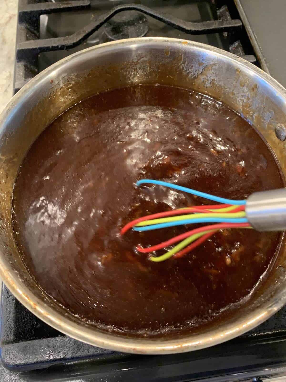 orange chicken sauce in the skillet