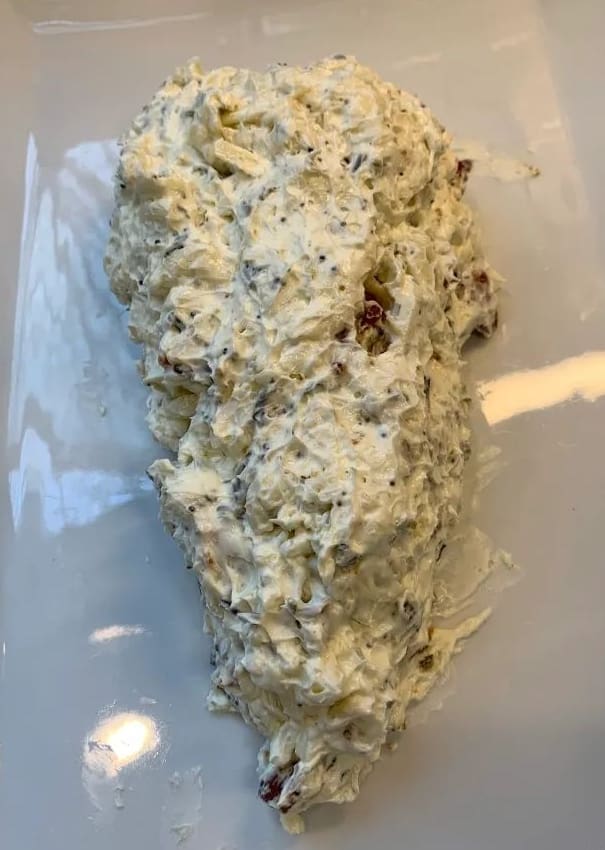 cream cheese mixture shaped into a carrot