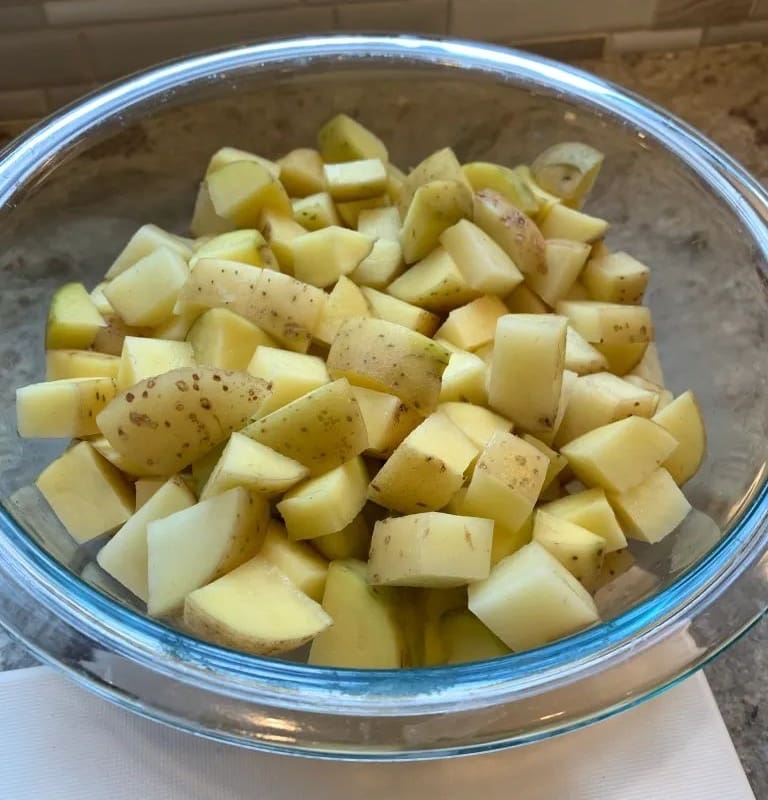 cut potatoes in a bowl