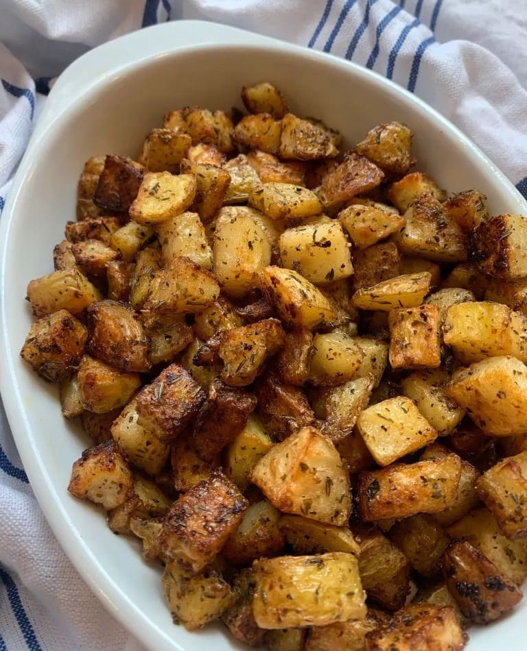 crispy potatoes in a serving dish 