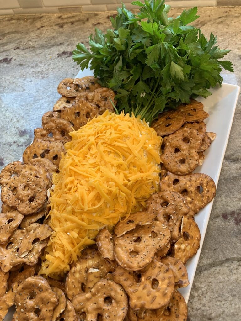 easter carrot cheese ball plated with chips