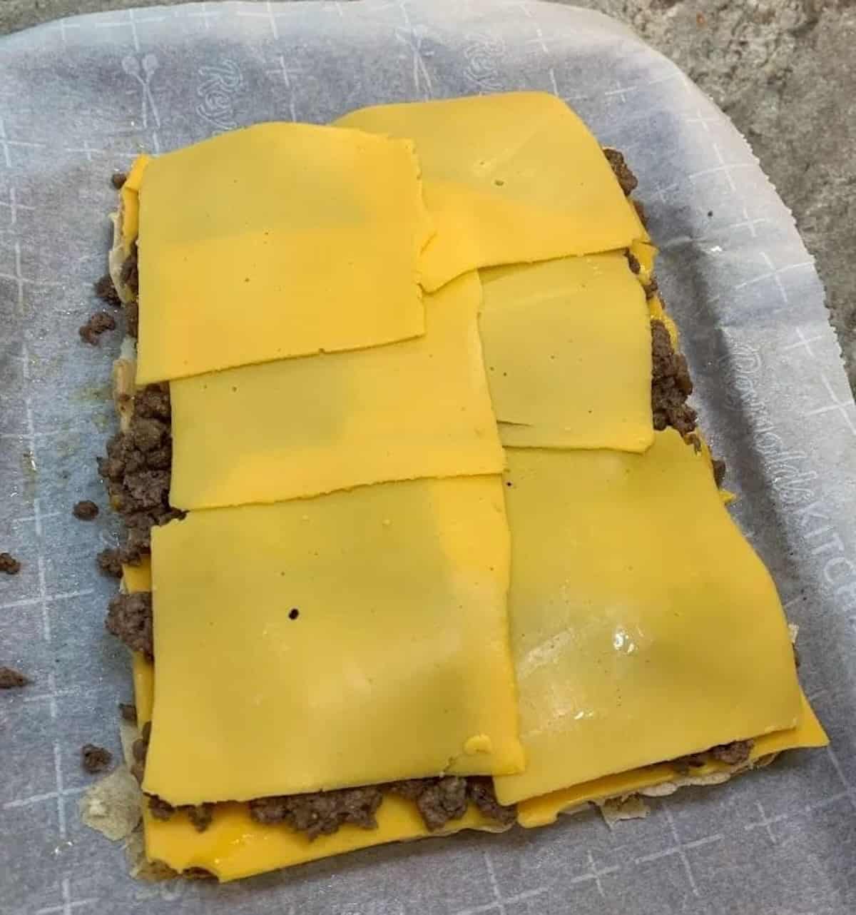 cheeseburger sliders with cooked ground beef and cheese