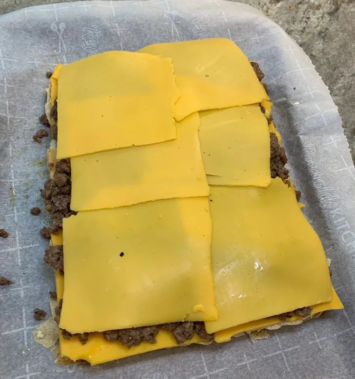 cheese on top of beef