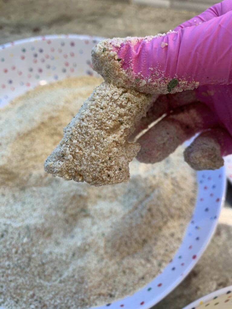 chicken dipped into the breadcrumbs