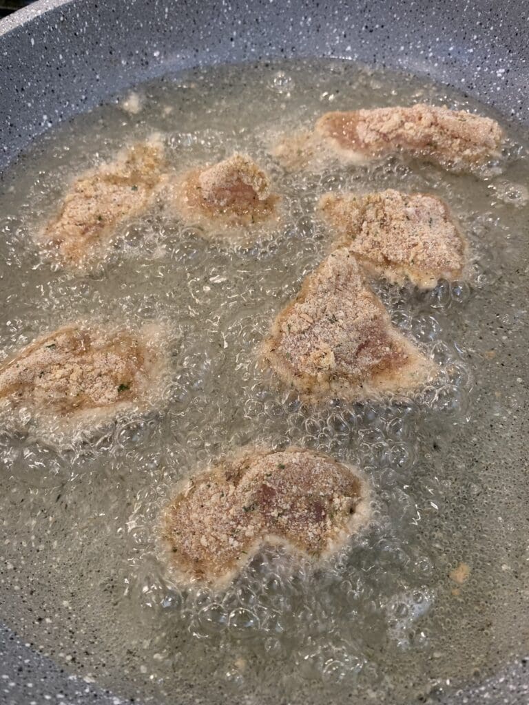 chicken getting fried