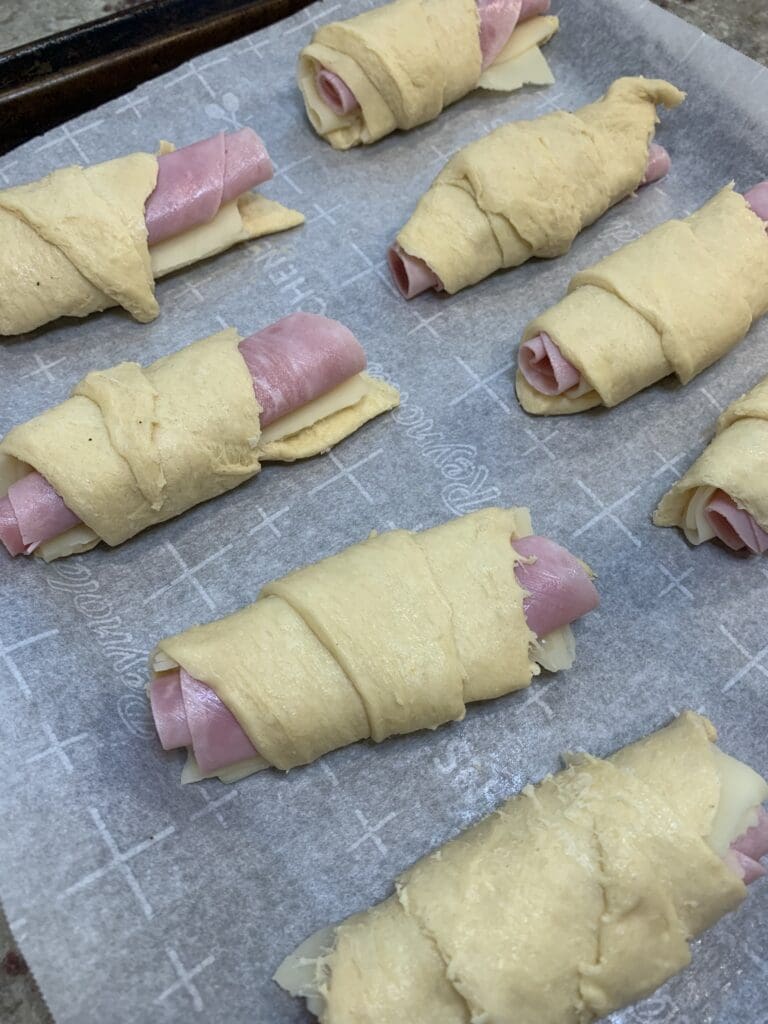 ham and swiss crescent rolls about to be baked