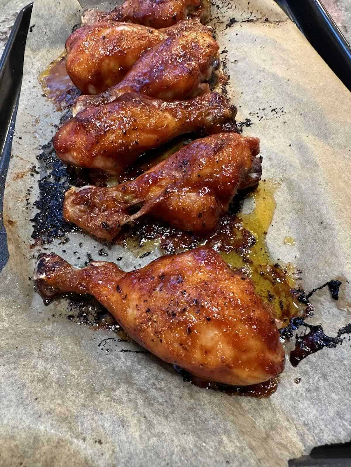 finished bbq drumsticks in bbq sauce