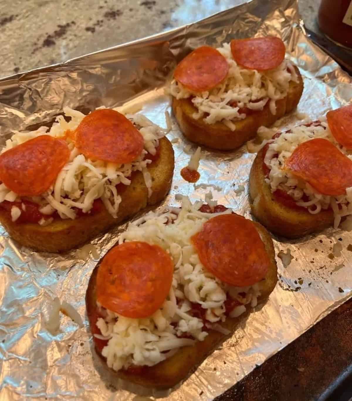 texas toast pepperoni pizza bout to go into the oven