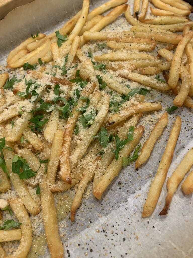 fries being seasoned