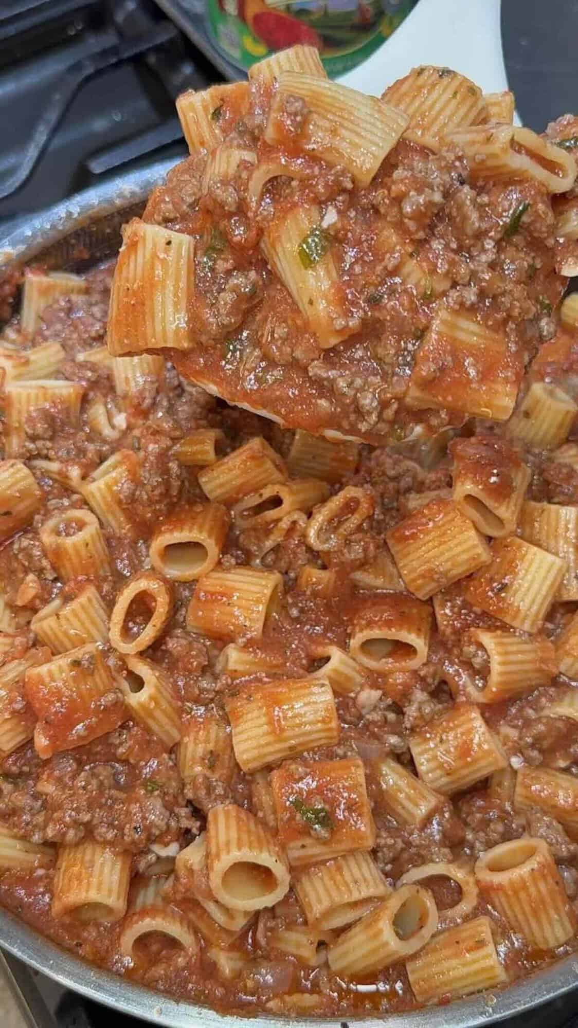 meat sauce for pasta tossed in rigatoni