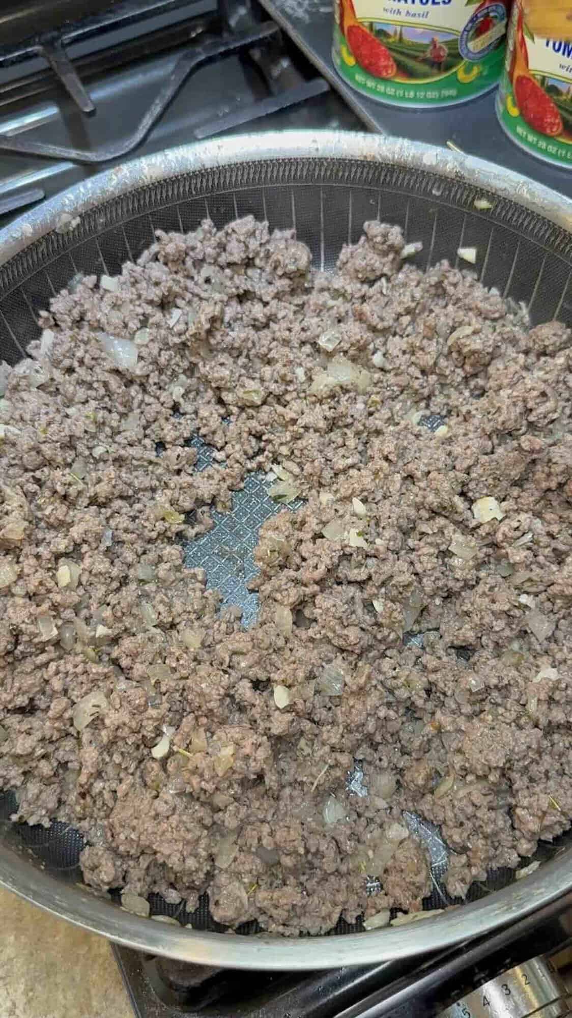 cooked and seasoned ground beef in skillet