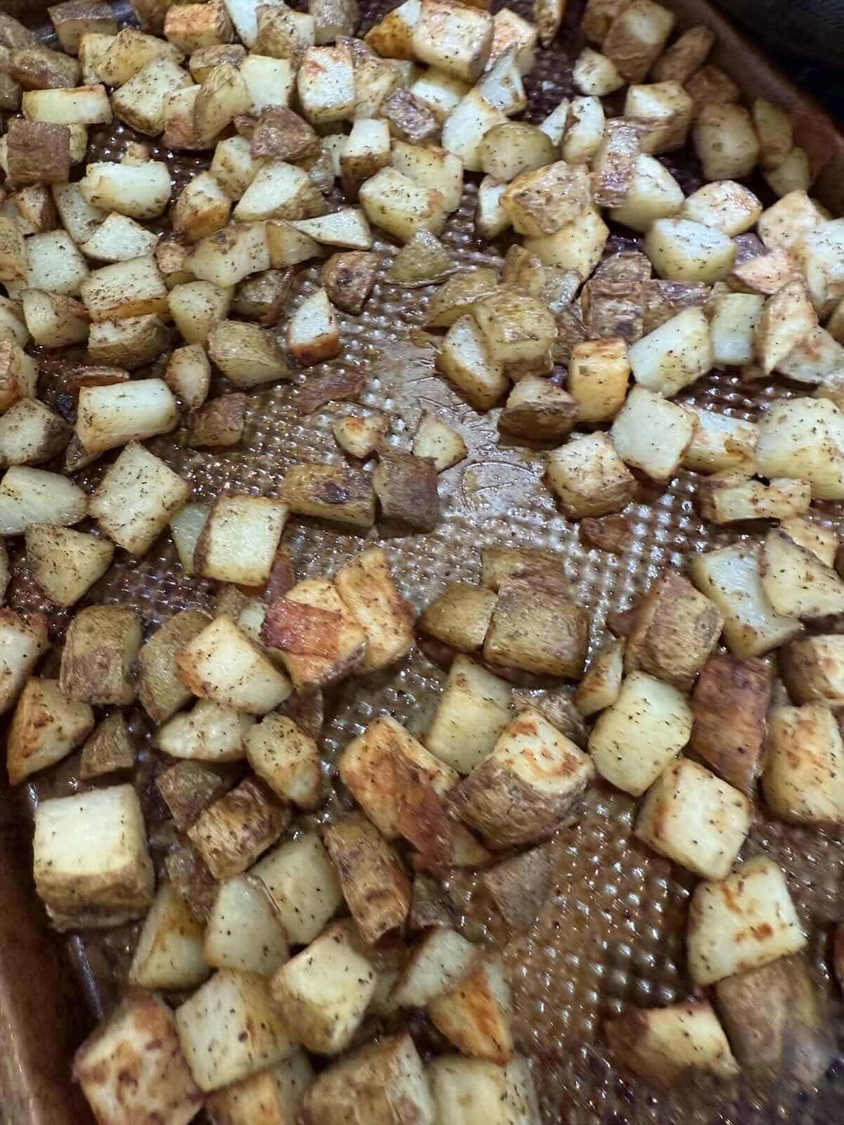 roasted potatoes on a sheet pan