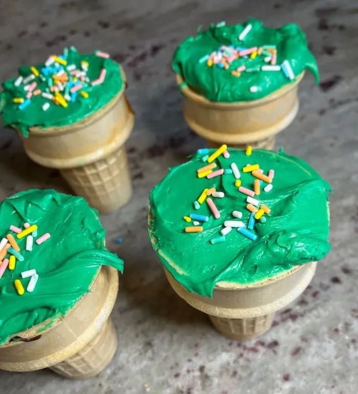 ice cream cone cupcakes with green icing