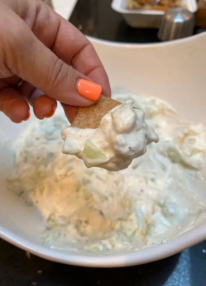 cucumber dip on wheat thin