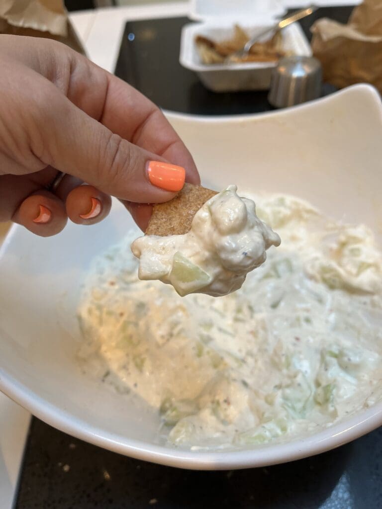 cucumber dip on a wheat thin