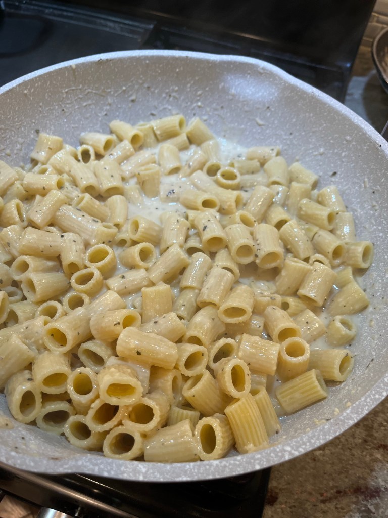 rigatoni in a skillet with sauce