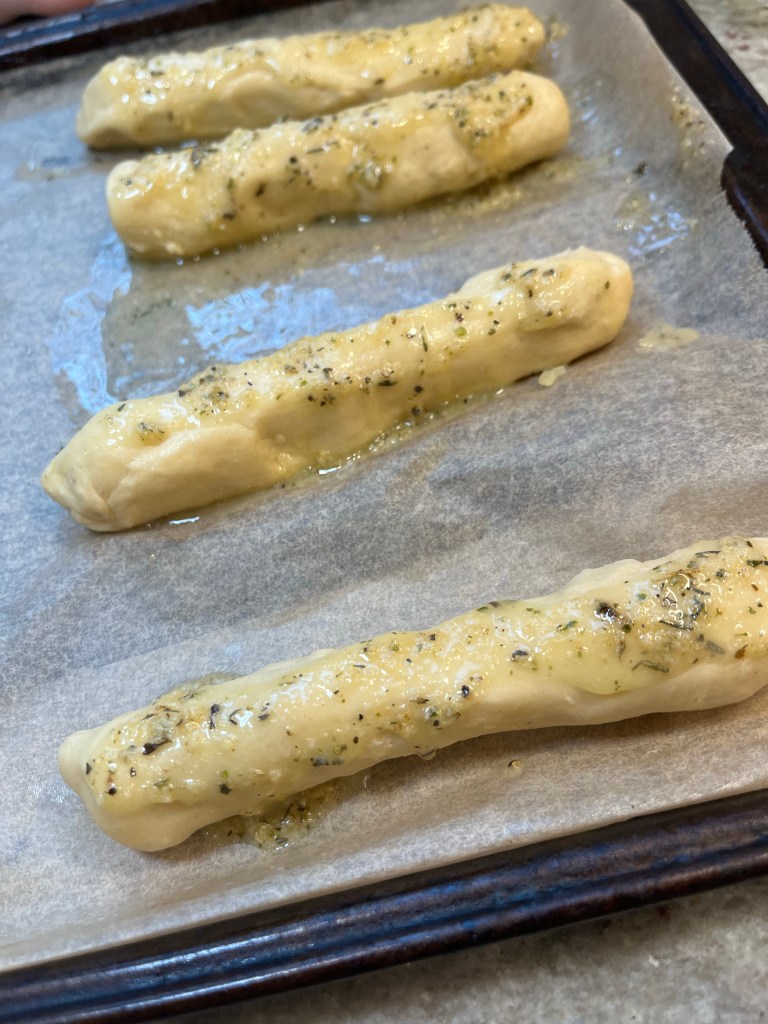 garlic butter on bread sticks