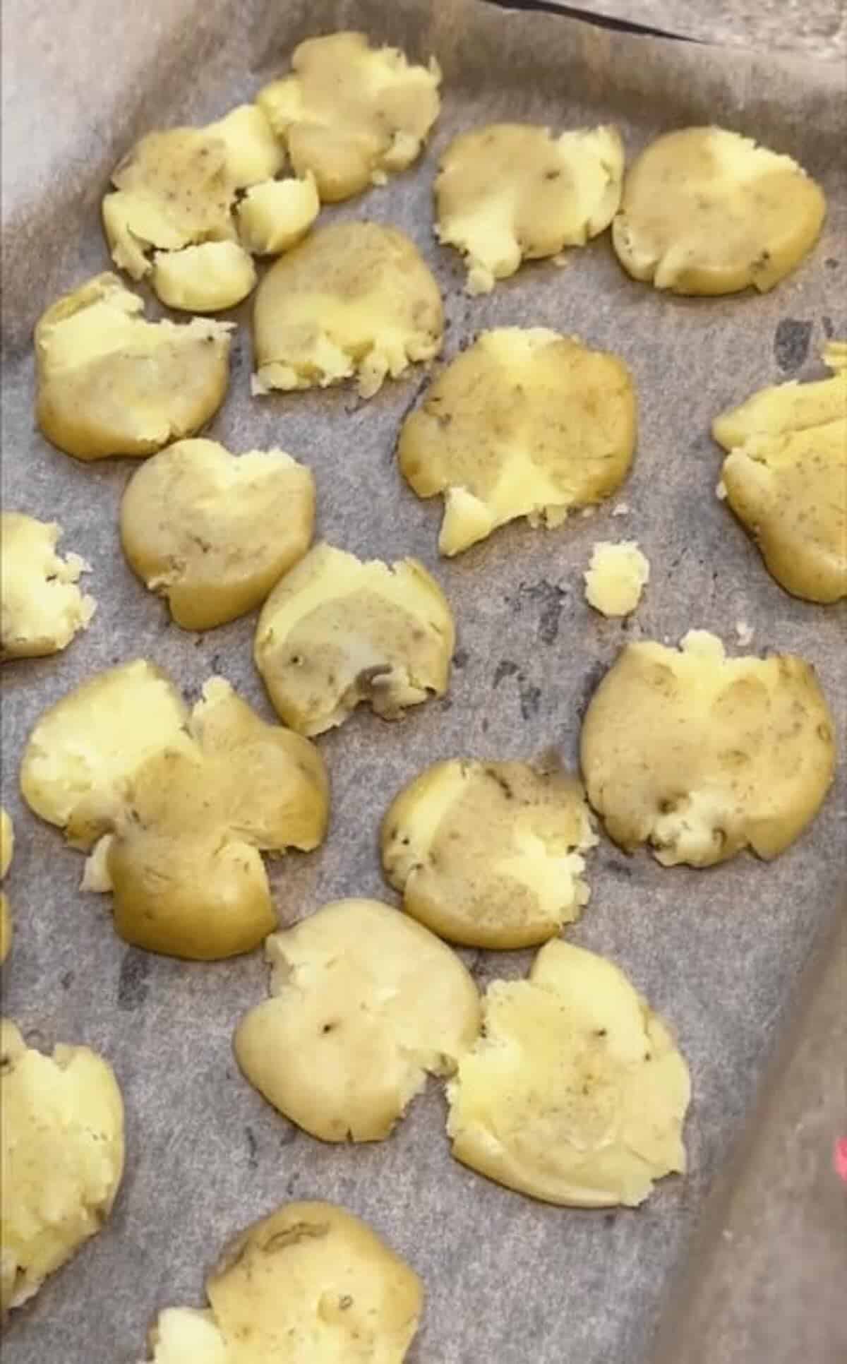 potatoes smashed on baking sheet