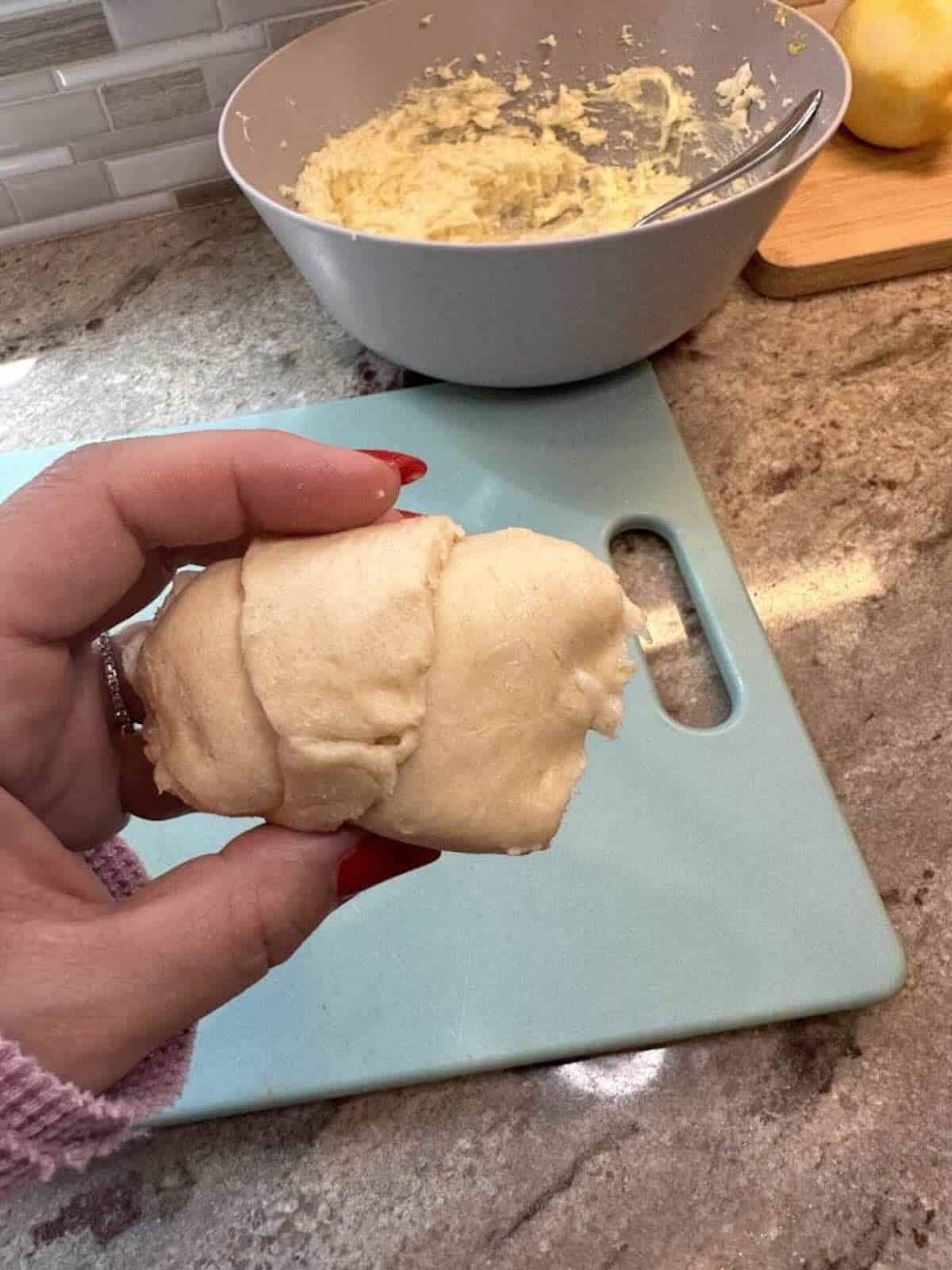 lemon cheesecake filling inside crescent rolls