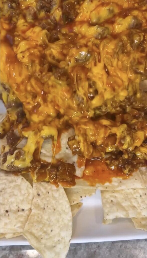 inside of skillet nachos showing melted cheese