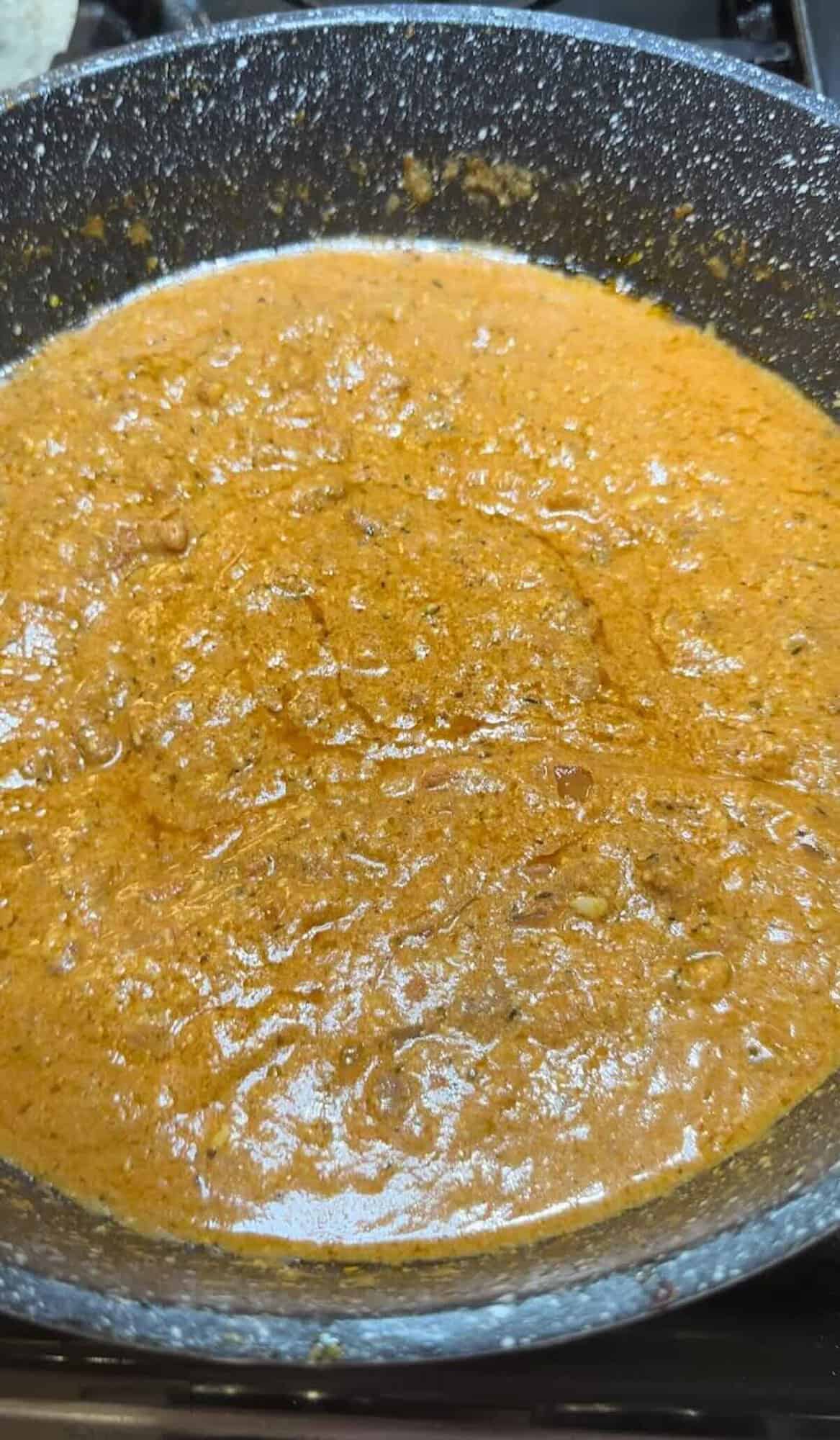 creamy tomato sauce simmering