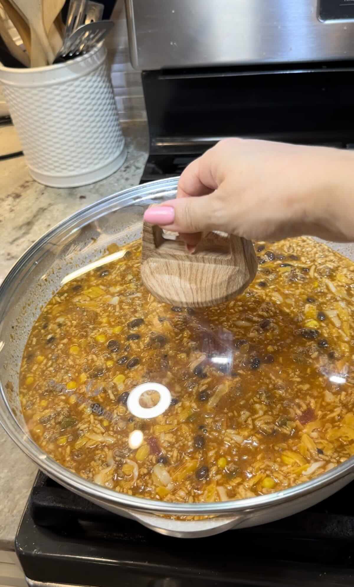 finished one pot cheesy taco rice in skillet