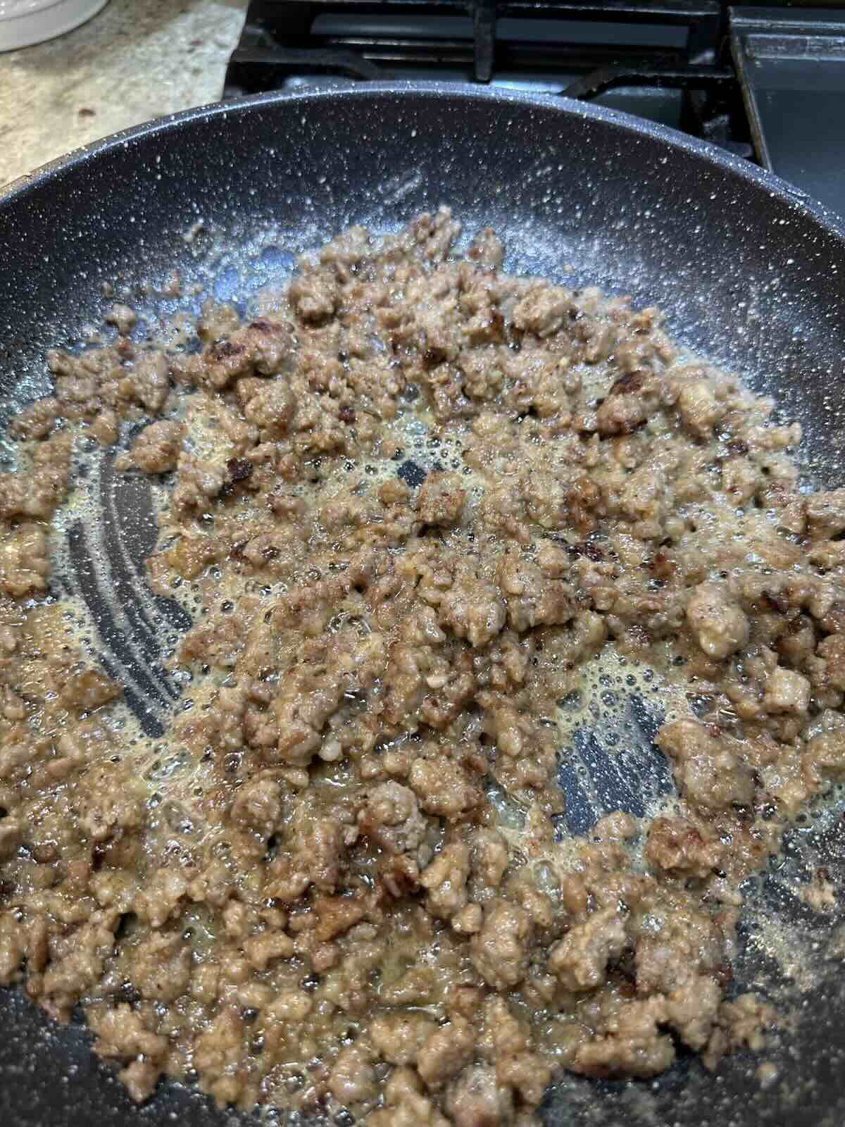breakfast sausage and butter in skillet