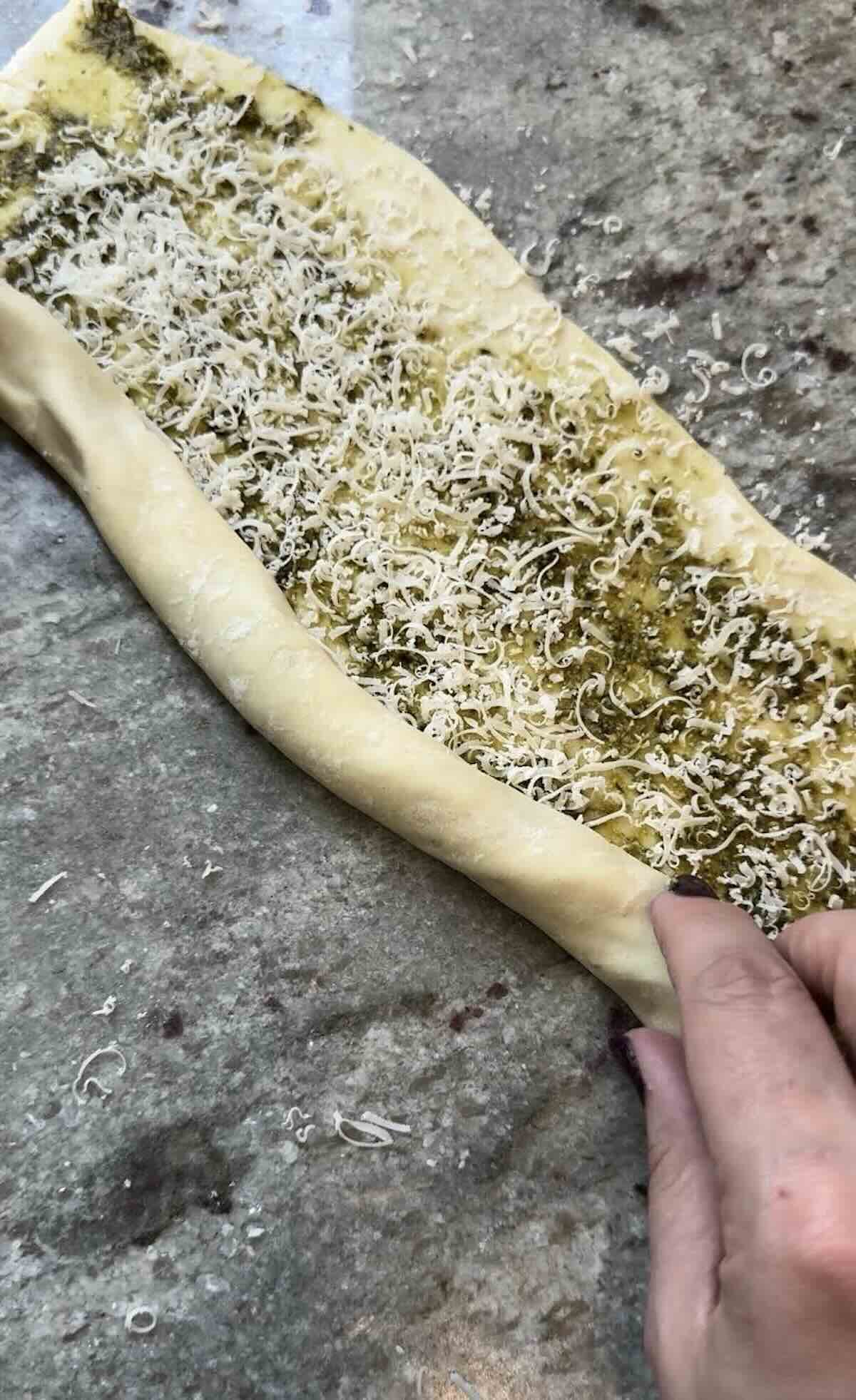 puff pastry with pesto and parmesan cheese