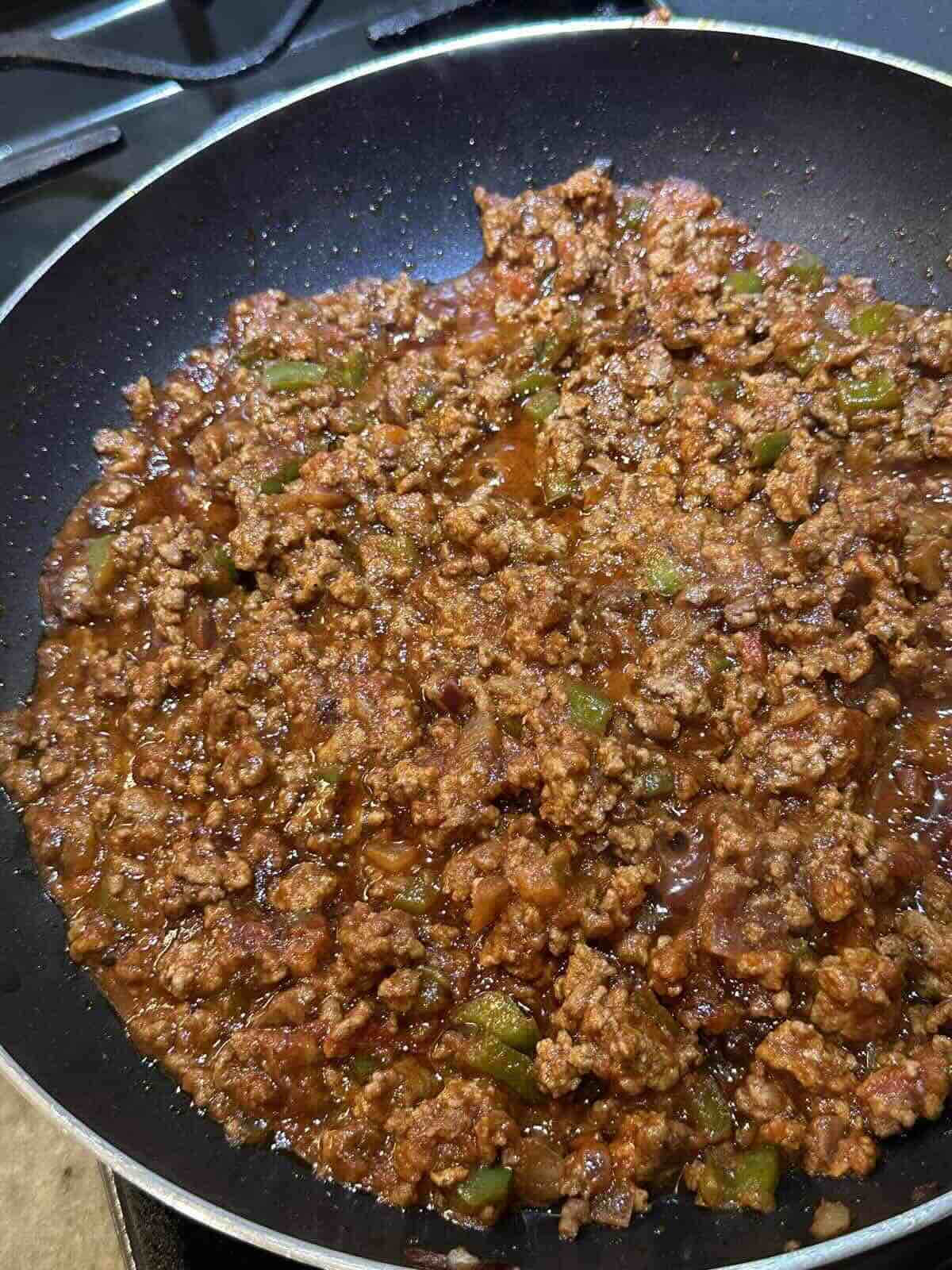 sloppy joe filling cooked in a skillet