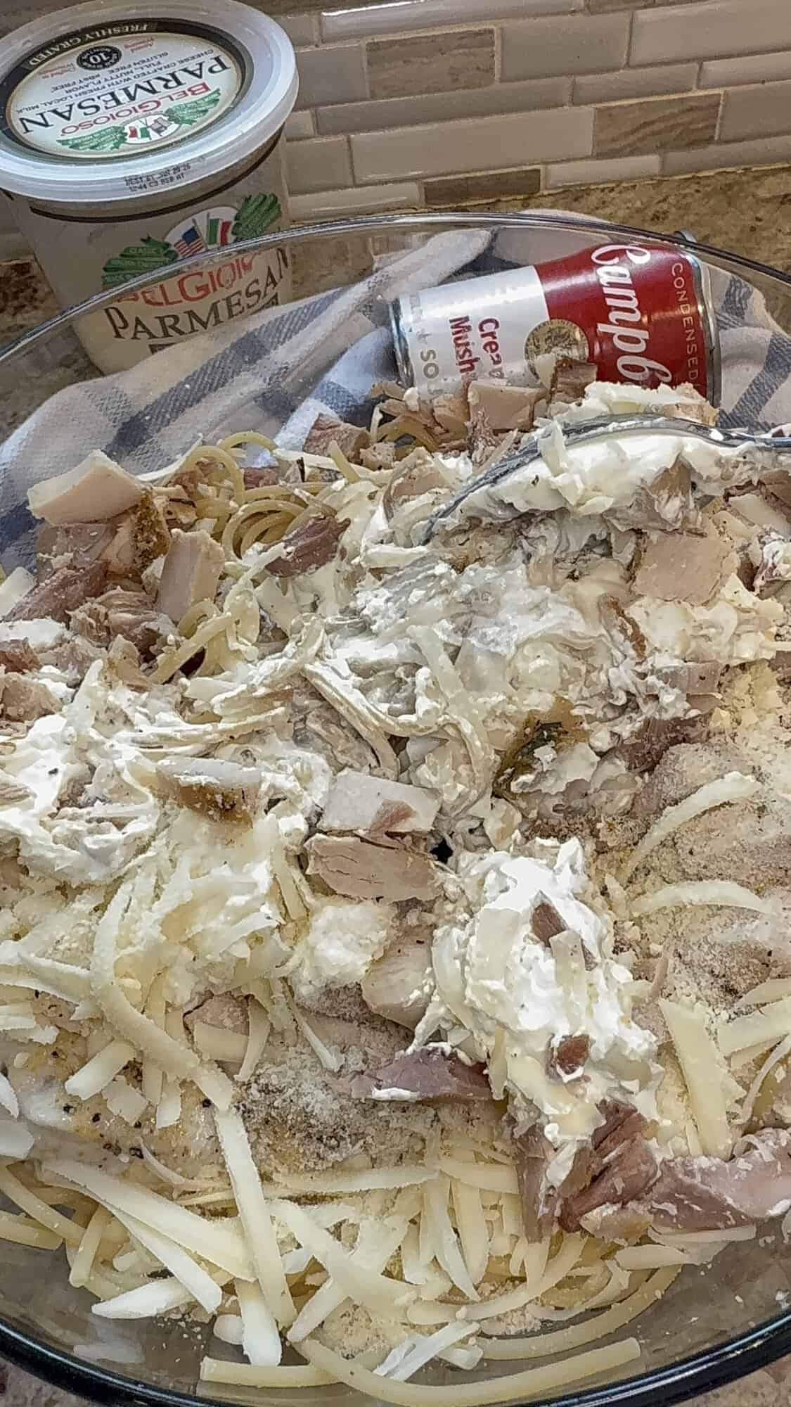 turkey tetrazzini ingredients mixed in a bowl