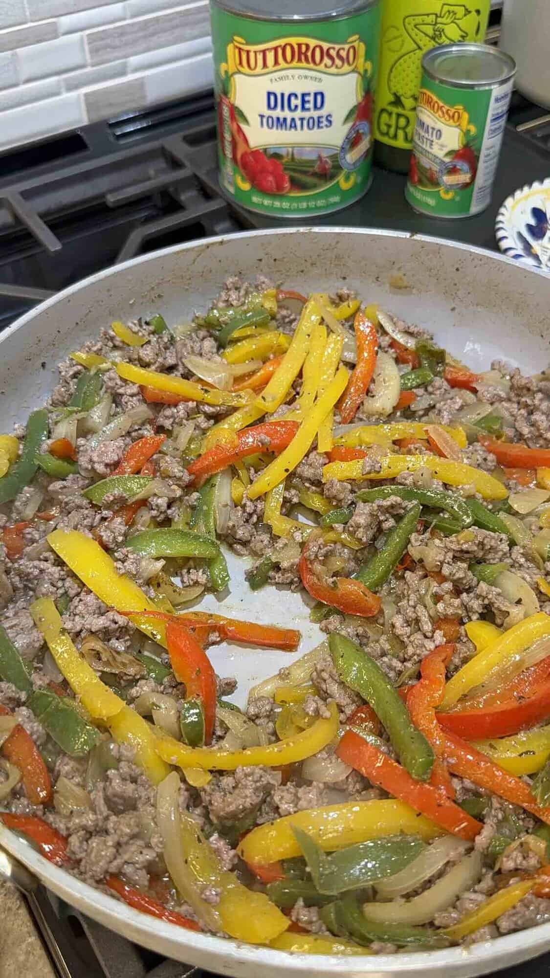 cooked ground beef and vegetables in skillet