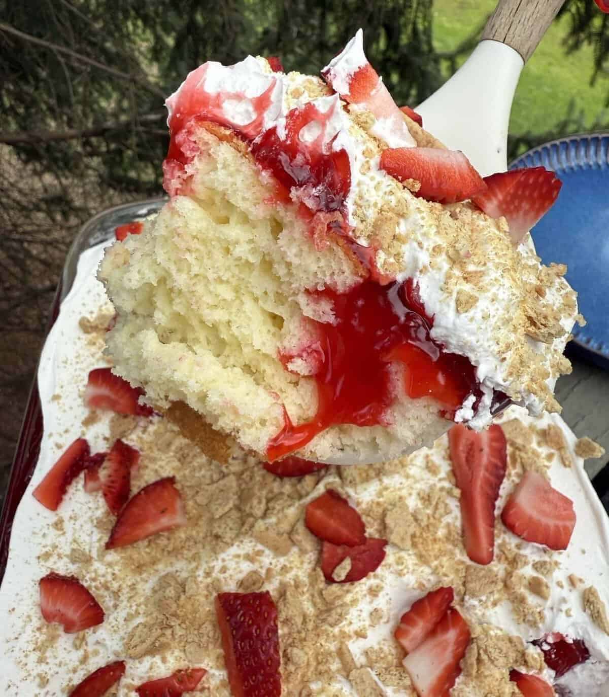 finished strawberries and cream poke cake