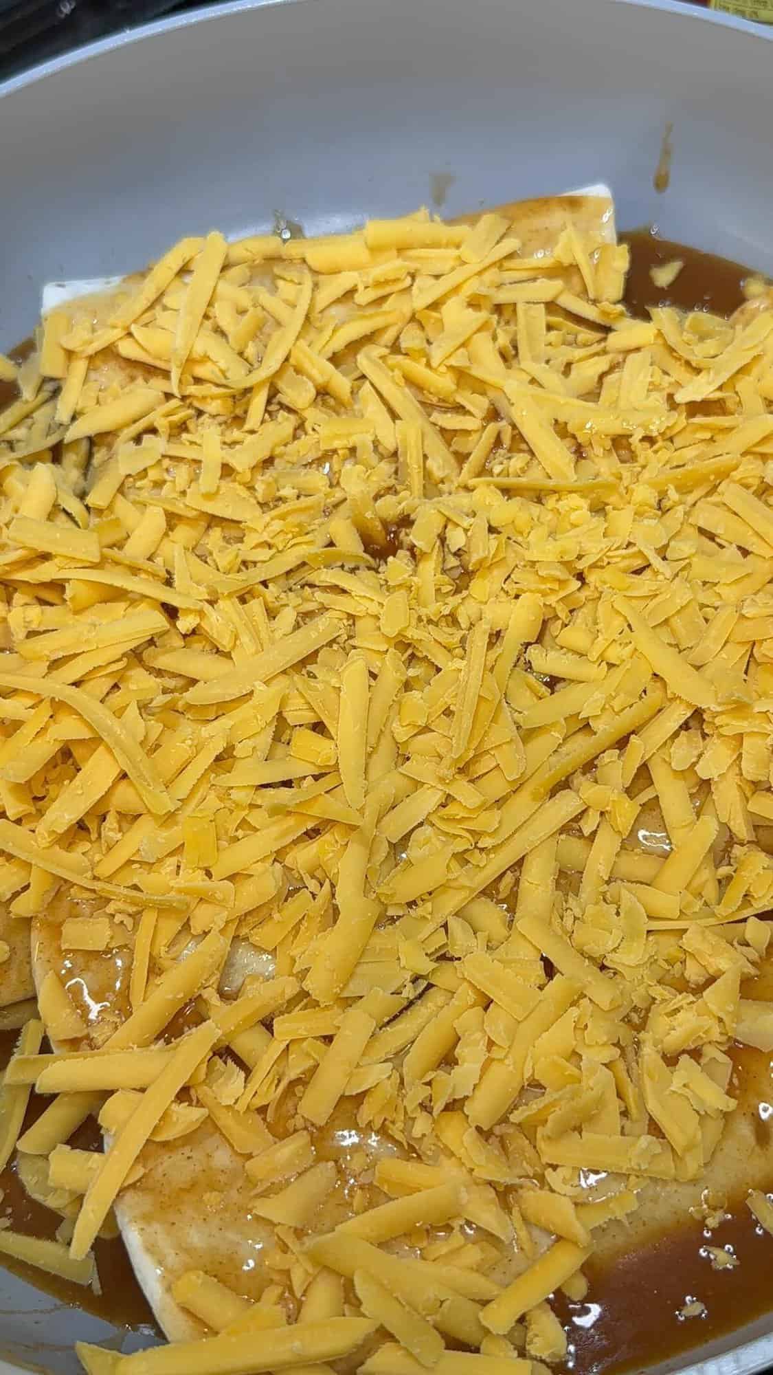 cheese on top of the skillet enchiladas