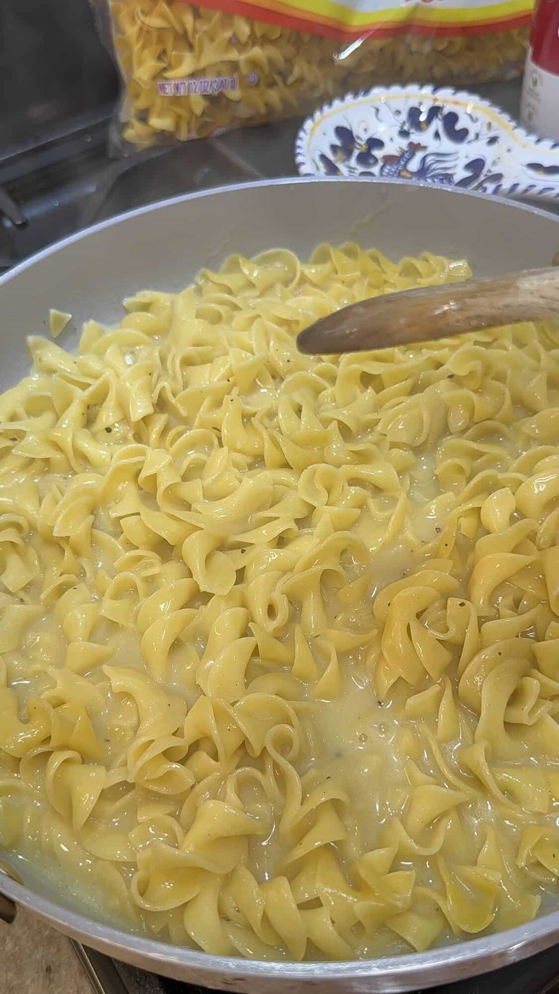 egg noodles submerged in broth
