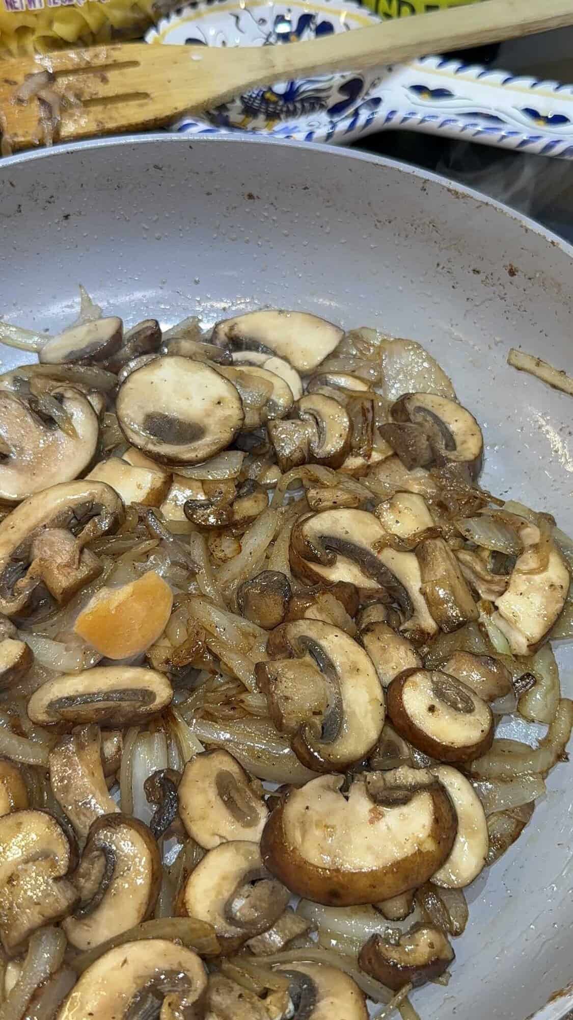 mushrooms and onion in large skillet